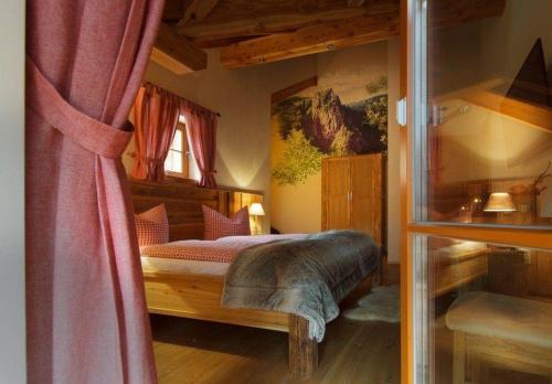 Postel nebo postele na pokoji v ubytování Chalets-zum-Ilsetal-Ilse-Chalet-Nr-19