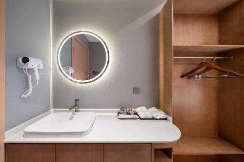 Koupelna v ubytování Xihe Hotel - Shanghai Jiuyuan Xietu Road Branch