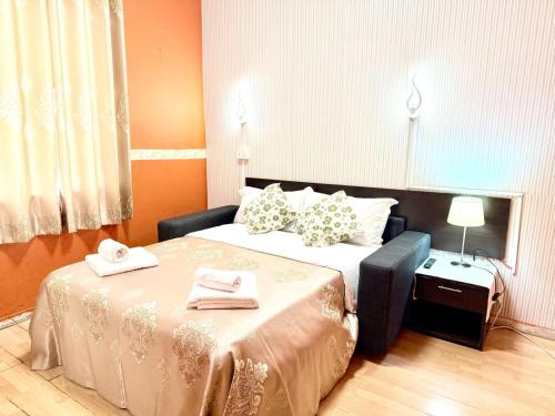 Postel nebo postele na pokoji v ubytování Green Guesthouse