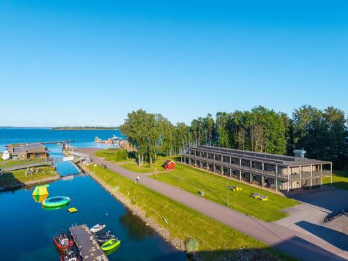 an aerial view of a building next to a river at RS Noatun in Horten