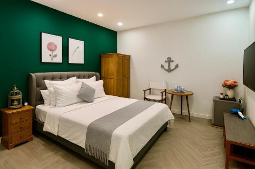 Katil atau katil-katil dalam bilik di Homestay Song Ngọc Phan Thiết