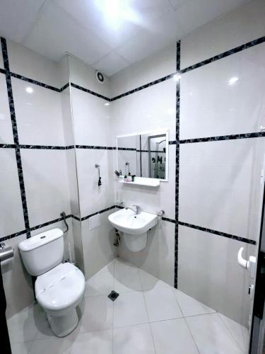 Koupelna v ubytování Deva Apartments