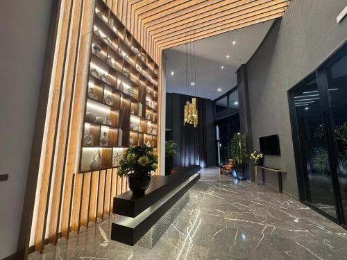 a lobby with a wall of wine bottles at Soho Boutique Casablanca in Casablanca
