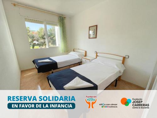 Posteľ alebo postele v izbe v ubytovaní Apartamentos Tierra de Irta 3000