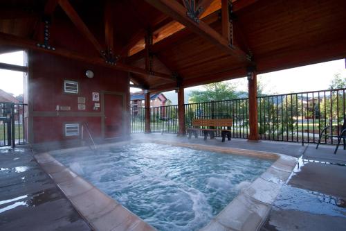 a hot tub in a pavilion with water at Wyndham Steamboat Springs 3BR Apartment with Resort Access in Steamboat Springs