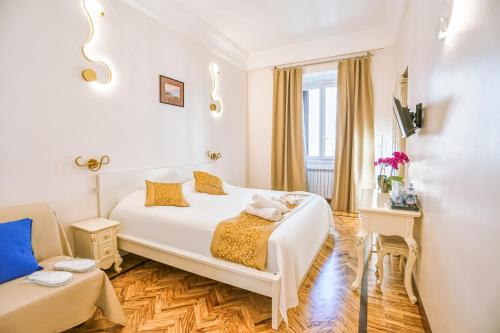 a hotel room with a bed and a window at Casa Pan in Rome