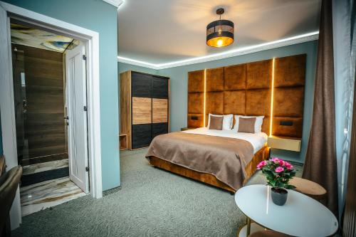 Postel nebo postele na pokoji v ubytování Fit Residence II