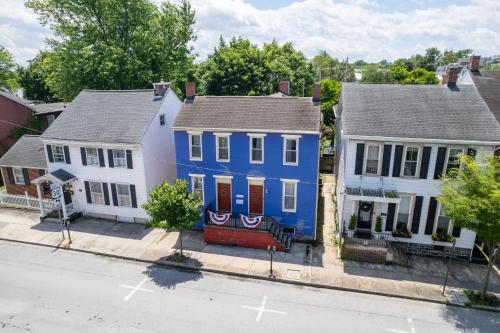 a house painted in the colors of the american flag at Historic Downtown Gettysburg Gem in Gettysburg