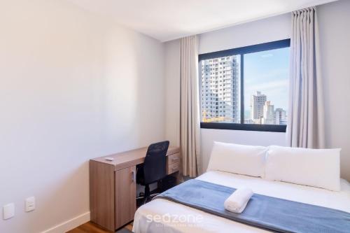 Ένα ή περισσότερα κρεβάτια σε δωμάτιο στο Apartamentos Completos a 700m da Praia - VNV
