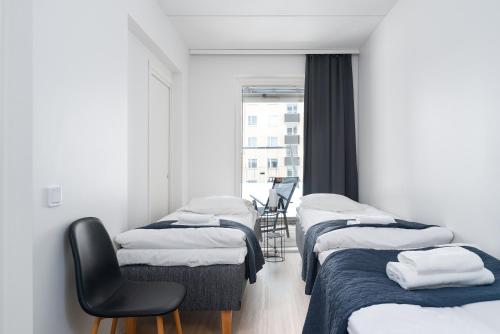 Postel nebo postele na pokoji v ubytování City 1bedroom with nice terace 100mb Wi-fi 3min from Train station