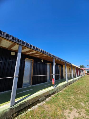 a building with a long row of windows on it at Albergue Centro de Ocio Luis Miguel in Fresno de la Fuente