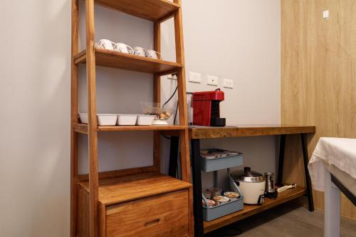 Cama o camas de una habitación en 漫居民宿- 一日僅接一組客人, 電梯, 電動車充電樁, 電動麻將, Switch