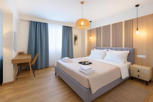 Ένα ή περισσότερα κρεβάτια σε δωμάτιο στο Niki Athens Suites - 404 - Cosy Apartment in Athens Historical Center
