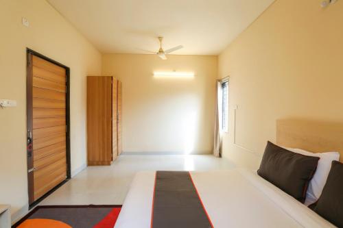 Katil atau katil-katil dalam bilik di Collection O Patra Inn