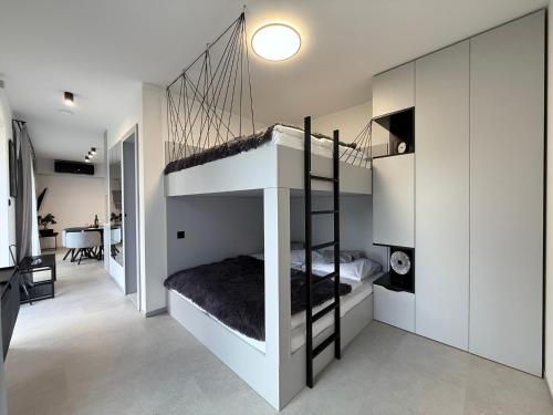 Ένα ή περισσότερα κρεβάτια σε δωμάτιο στο ELEM apartments