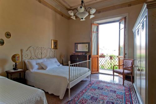 Postel nebo postele na pokoji v ubytování Cosetta Guest House