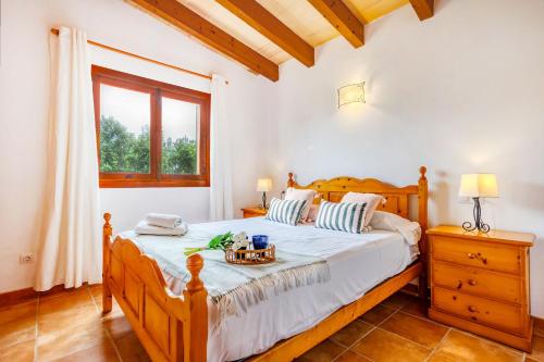 Postel nebo postele na pokoji v ubytování Chalet Turó by dracmallorca