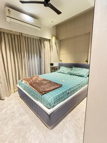 Ένα ή περισσότερα κρεβάτια σε δωμάτιο στο Blossom Exotica Luxury Stay