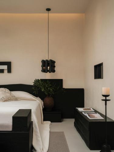 Una cama o camas en una habitación de JIYU Hotel