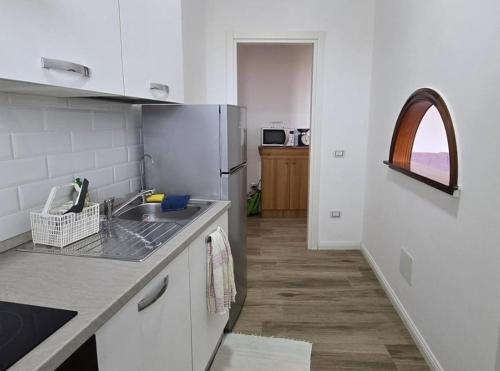 Kuchyň nebo kuchyňský kout v ubytování I due Fratelli