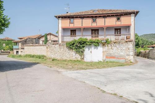 an empty street in front of a house at Biendella El Desván 
