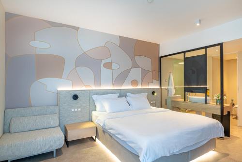 Ένα ή περισσότερα κρεβάτια σε δωμάτιο στο Hotel Zenith
