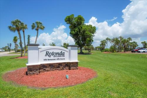 a sign for a park with palm trees at 974 Rotunda in Rotonda West
