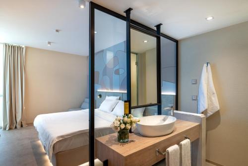 Ένα ή περισσότερα κρεβάτια σε δωμάτιο στο Hotel Zenith