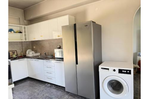 Kuchyň nebo kuchyňský kout v ubytování Villa Natalia