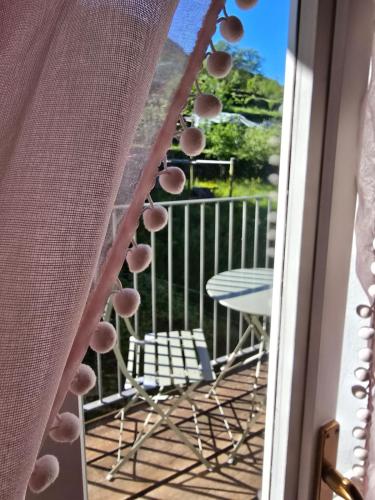 Balkón nebo terasa v ubytování Le Allegre Comari di Nesso, casa e benessere