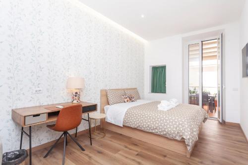 Postel nebo postele na pokoji v ubytování Vatican Vittoria Suites - Vatican museums