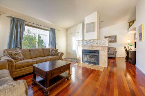a living room with a couch and a fireplace at Desert View Home Pool & Hot Tub in Phoenix