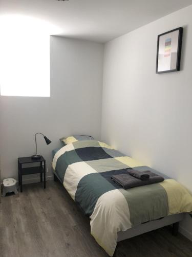 Ein Bett oder Betten in einem Zimmer der Unterkunft Gîte de l'hôtel Castel