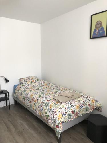 Ein Bett oder Betten in einem Zimmer der Unterkunft Gîte de l'hôtel Castel