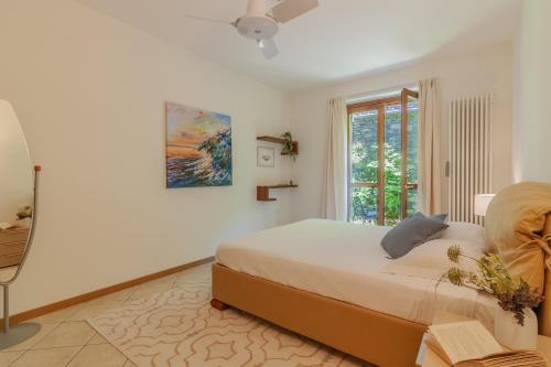 En eller flere senge i et værelse på Giardino al Tramonto