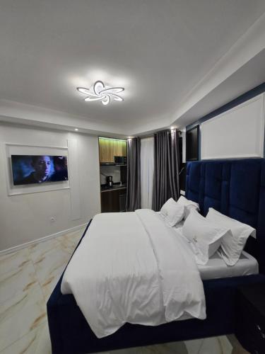 Ein Bett oder Betten in einem Zimmer der Unterkunft Suna'a home Logpom