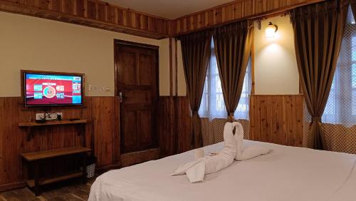 Μια τηλεόραση ή/και κέντρο ψυχαγωγίας στο Hotel Golden Orchid