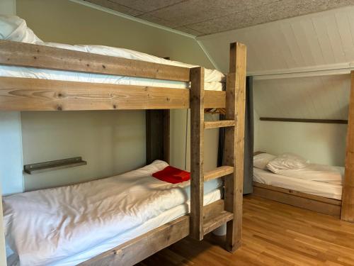a couple of bunk beds in a room at La Casa Klippan in Rockneby