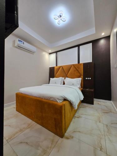 Ein Bett oder Betten in einem Zimmer der Unterkunft Suna'a home Logpom