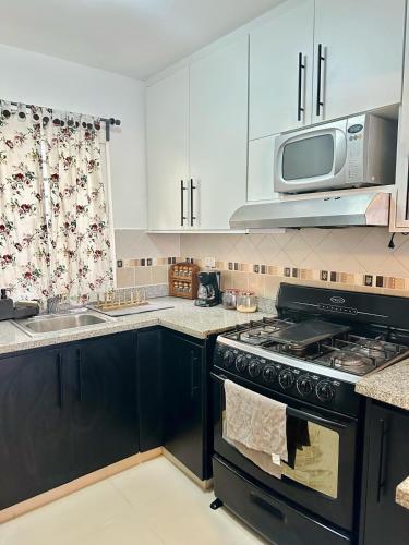 Η κουζίνα ή μικρή κουζίνα στο Modern, Elegant & Comfortable Apartment