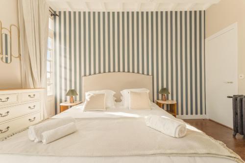 Cama o camas de una habitación en Le Manoir du Vert Galant