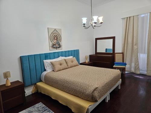 En eller flere senge i et værelse på Casa Branca