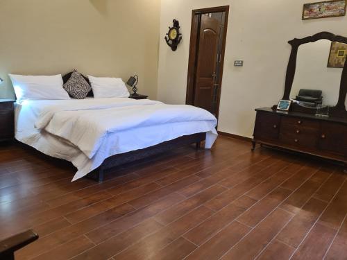 Кровать или кровати в номере Haven Lodge - 3BR Luxury Home in AWT Lahore