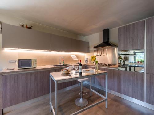 Dapur atau dapur kecil di Holiday Home Belbo by Interhome