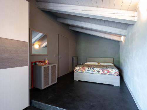 Katil atau katil-katil dalam bilik di Holiday Home Belbo by Interhome