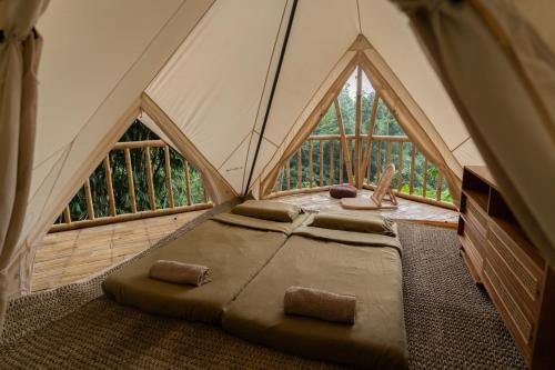Cama o camas de una habitación en Nysa Forest Sanctuary