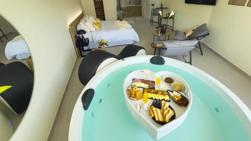 a heart shaped plate of food on a table in a room at Panorama Suites in Jorquera