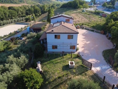 an aerial view of a house on the river at Agriturismo Ca' Belluccio in Santa Maria del Piano