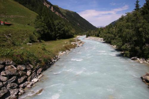 a river in the middle of a mountain at Polaris 1 004 LUXE & SKI LIFT apartment 6 pers in Zinal