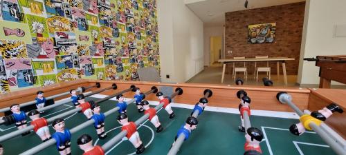 a group of dolls playing a game of bowling at Claris B&B - Hostel in Praia